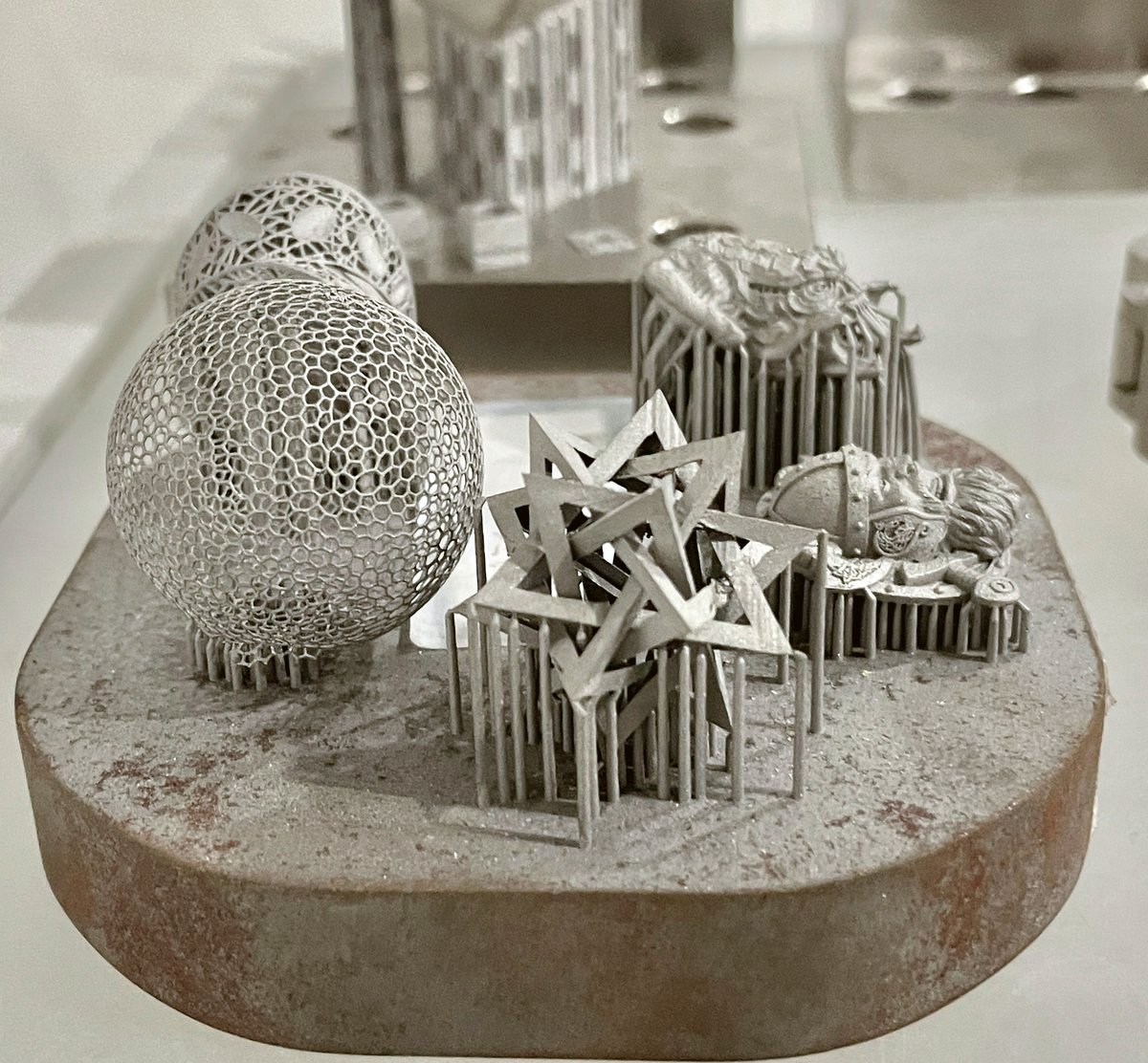 Printed titanium lattice structures showing the porous geometry achievable with metal 3D printing